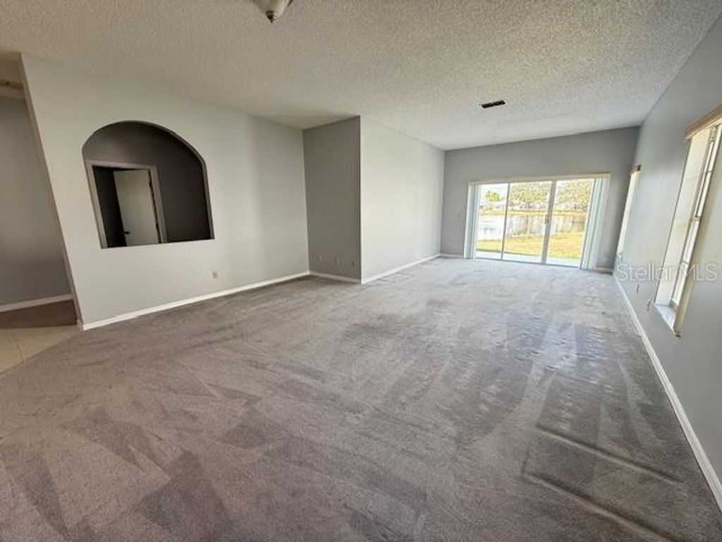 Photo of 5773 Parkview Lake Drive, Orlando, FL 32821 (MLS # O6388185)