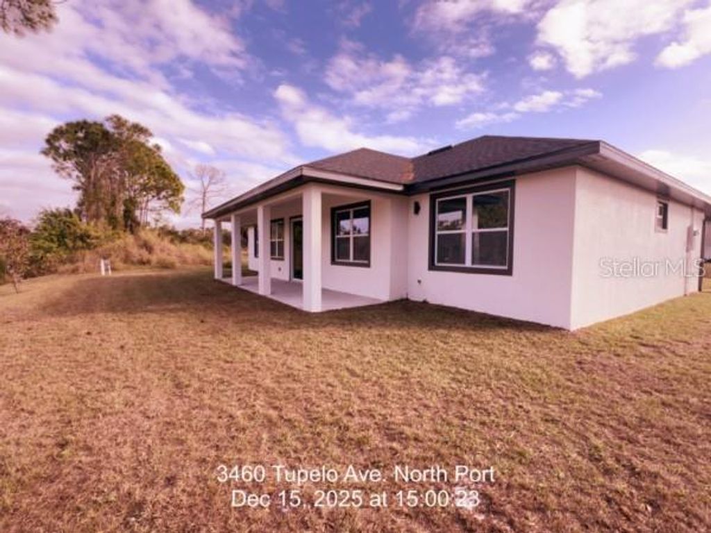 Photo of 3460 Tupelo Avenue, North Port, FL 34286 (MLS # D6145655)