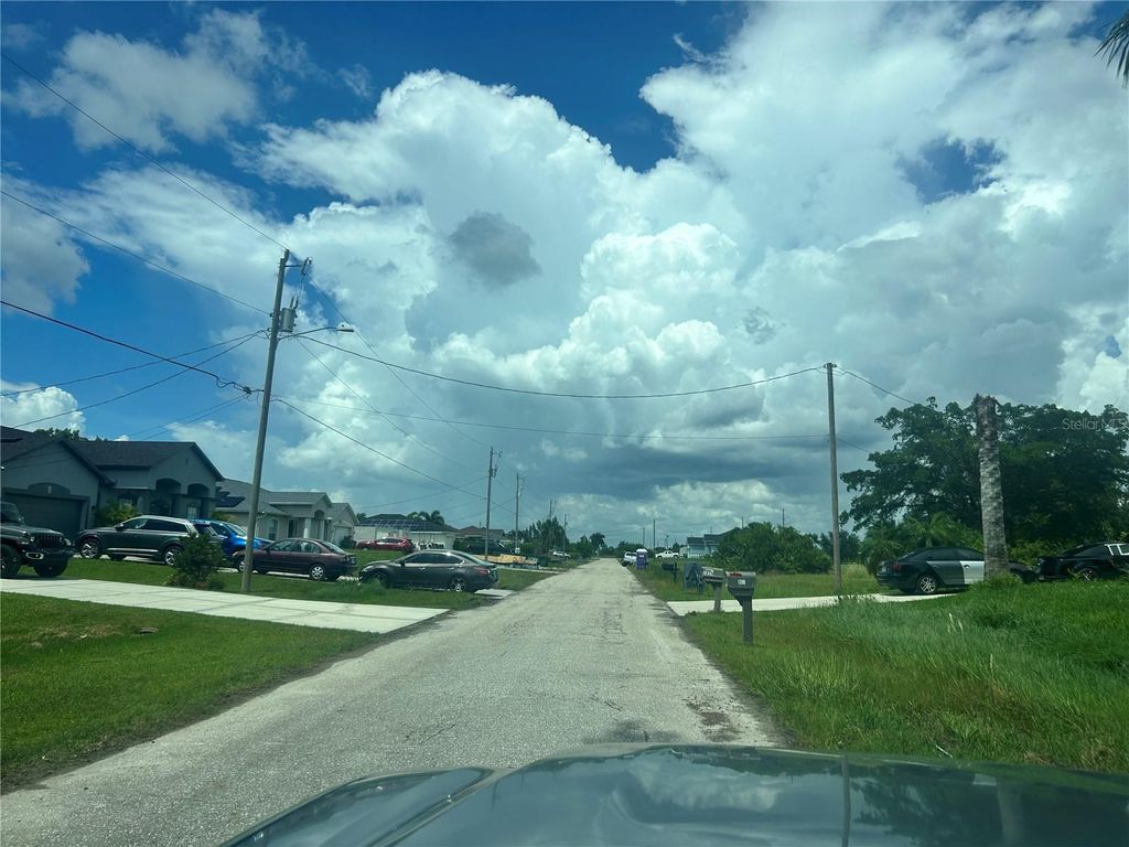 Photo of 1219 NW 24th Place, Cape Coral, FL 33993 (MLS # TB8419456)