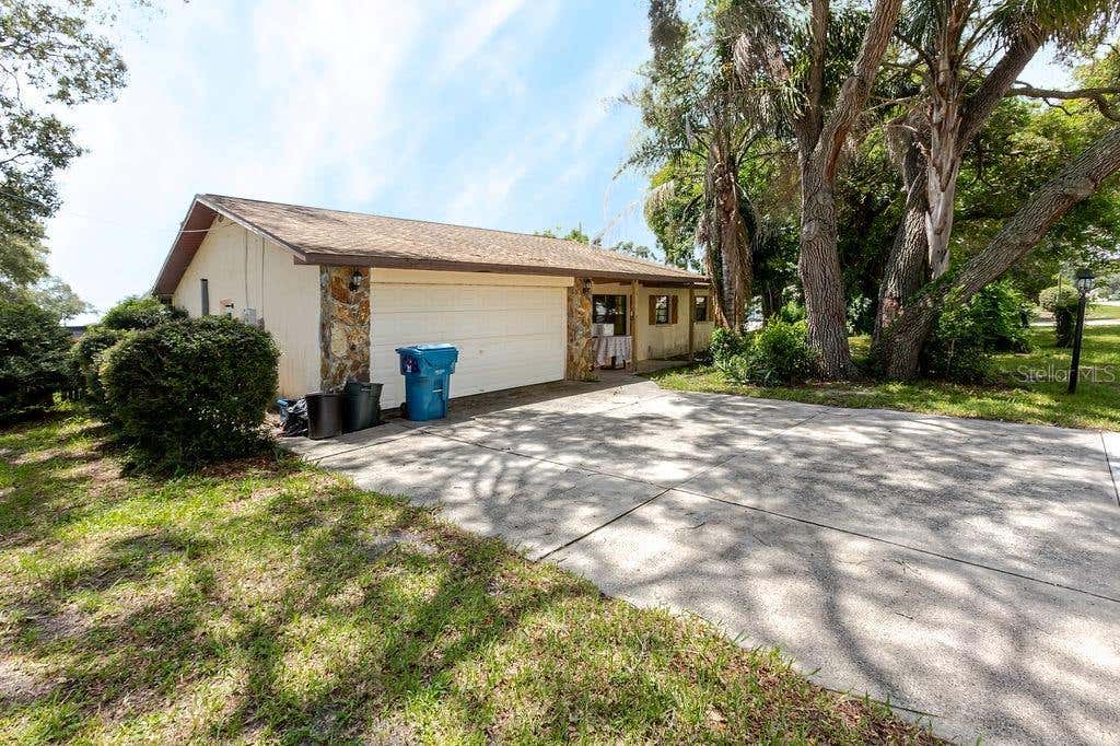 Photo of 1042 Tryon Circle, Spring Hill, FL 34606 (MLS # TB8531650)