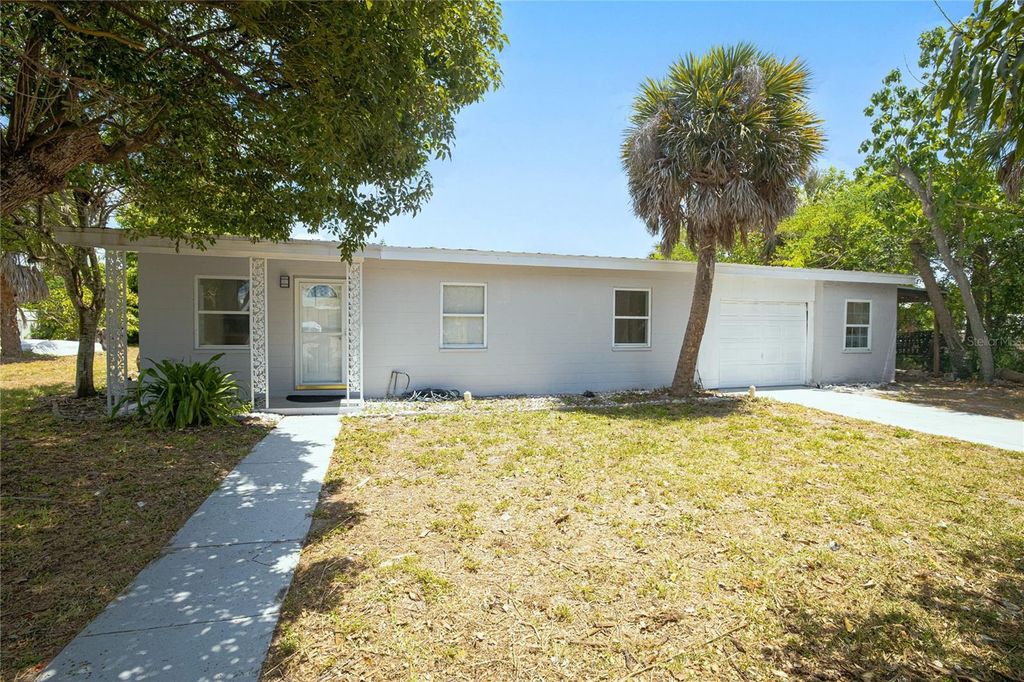 Photo of 203 Waterway Circle NE, Port Charlotte, FL 33952 (MLS # C7525395)