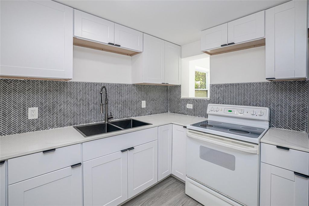 Photo of 203 Waterway Circle NE, Port Charlotte, FL 33952 (MLS # C7525395)