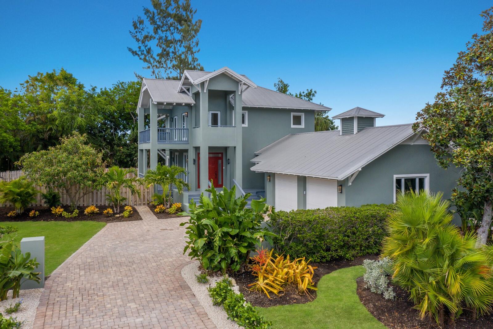 One or more photo(s) has been virtually staged. Introducing a stunning 3 bedroom, 3.5 bath, 2-story home, perfectly nestled on the tranquil north end of Longboat Key. This fully renovated gem is a true paradise, offering a blend of luxury and comfort. Step inside and be captivated by the elegant design and meticulous attention to detail throughout. The spacious living areas are bathed in natural light, creating an inviting and warm ambiance. The gourmet kitchen, complete with top-of-the-line appliances and stylish finishes, is a haven for any culinary enthusiast.
Escape to your own private oasis in the backyard, where you'll find a sparkling pool, perfect for cooling off on those warm Florida days. The freshly landscaped grounds provide a serene backdrop, offering a sense of tranquility and relaxation. With a 3-car garage, you'll have plenty of space for your vehicles and storage needs. This home truly caters to your every desire, ensuring both convenience and functionality. This community offers a private dock and kayak launch with a nearby beach access. All this near vibrant Downtown Sarasota, dining, shopping and theaters. Whether you're seeking a permanent residence or a vacation retreat, this home is bound to exceed your expectations. Don't miss the opportunity to own this magnificent property. Schedule a showing today and experience the ultimate in luxury coastal living! Several rooms have been virtually stated for visualization.