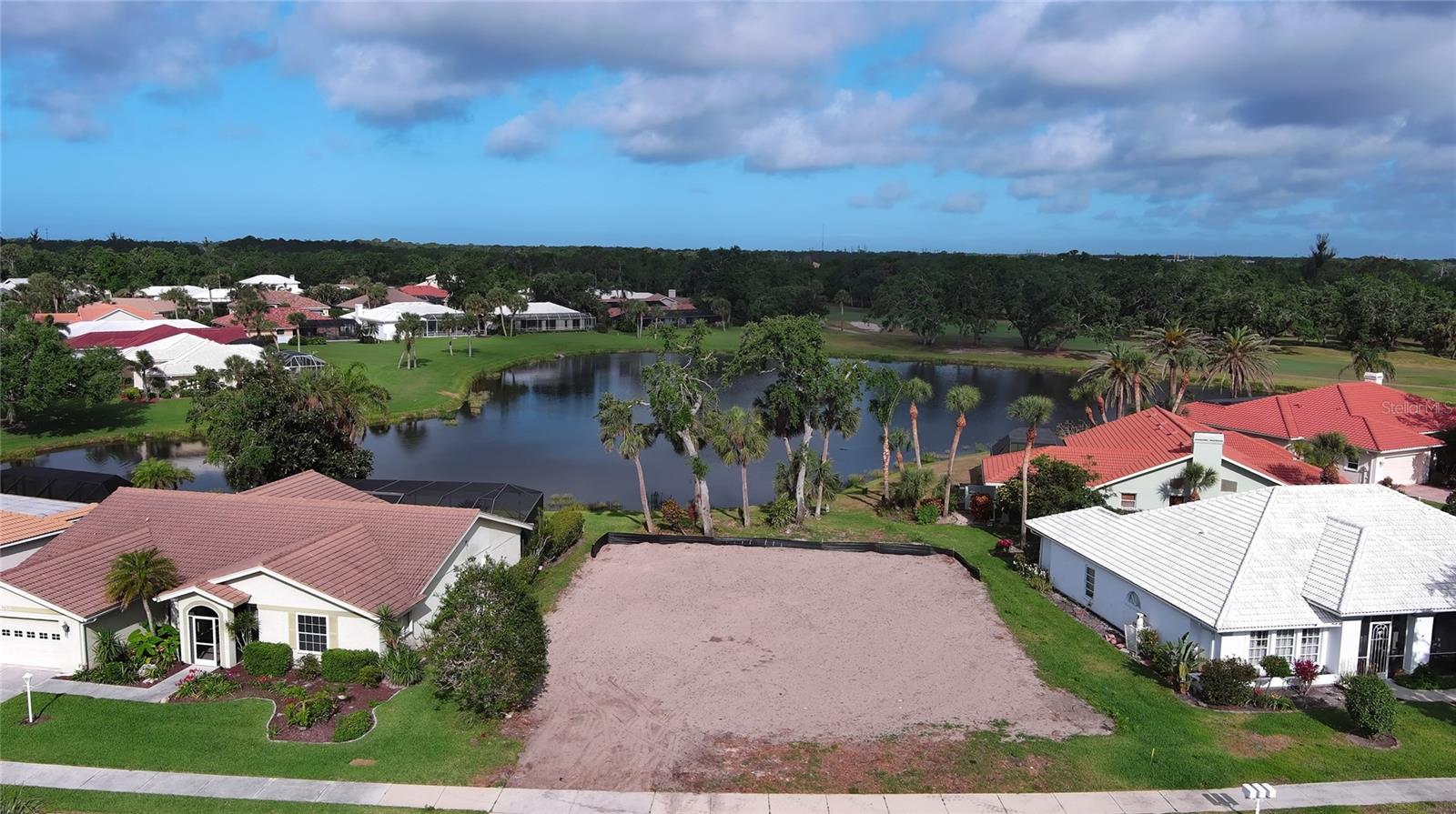 Extremely rare opportunity! Build your dream home in the exclusive and exceedingly desirable Waterford community. On this 8355' waterfront lot you will find a peaceful and inviting location, with views of both the golf course and the wildlife drawn to the water at your back door. Waterford amenities include 27 holes of golf, junior olympic pool, fitness center, sauna & Har-Tru tennis courts, all of this and less than 1 mile from your new home. As you enjoy the Waterford Sports Complex, Restaurant and Golf Club you will meet neighbors and make new friends. And within minutes you'll find the charming and friendly town of Venice, with beaches, dining, shopping and many cultural activities. Truly a paradise awaits!