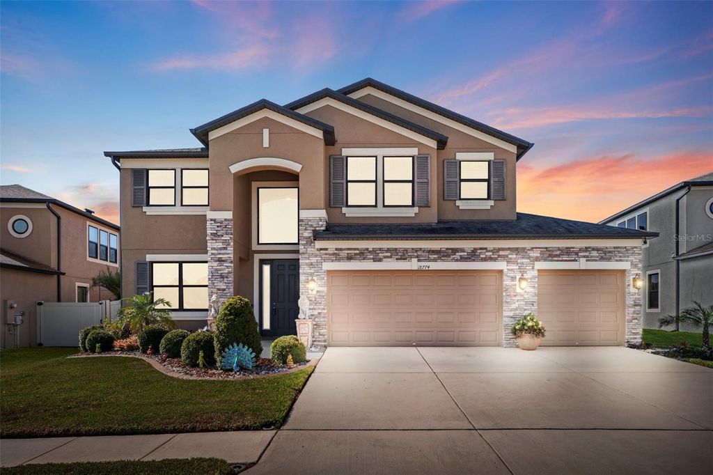 Photo of 18774 Malinche Loop, Spring Hill, FL 34610 (MLS # TB8375813)