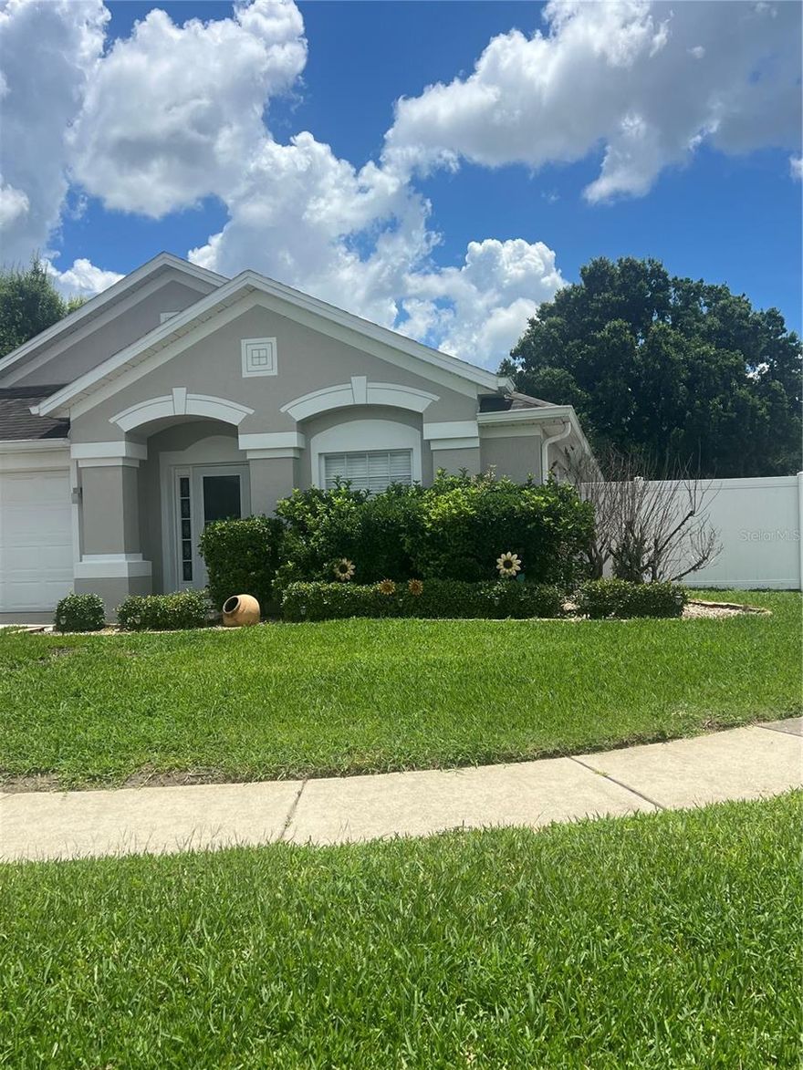 Beautiful 4- Bedroom, 2-bath home on a desirable corner lot! Featuring a private screen porch, spacious living areas, and a prime location just steps from the community pool and recreation park. Conveniently located near The Loop, shopping, dining, major highways, and Central Florida's famous theme parks. Don't miss this fantastic opportunity!