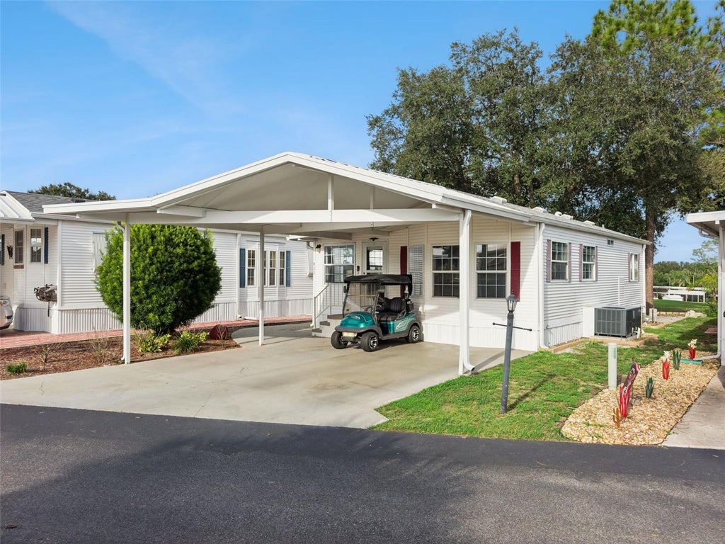 Photo of 422 Gary Player Drive, Davenport, FL 33837 (MLS # S5157812)