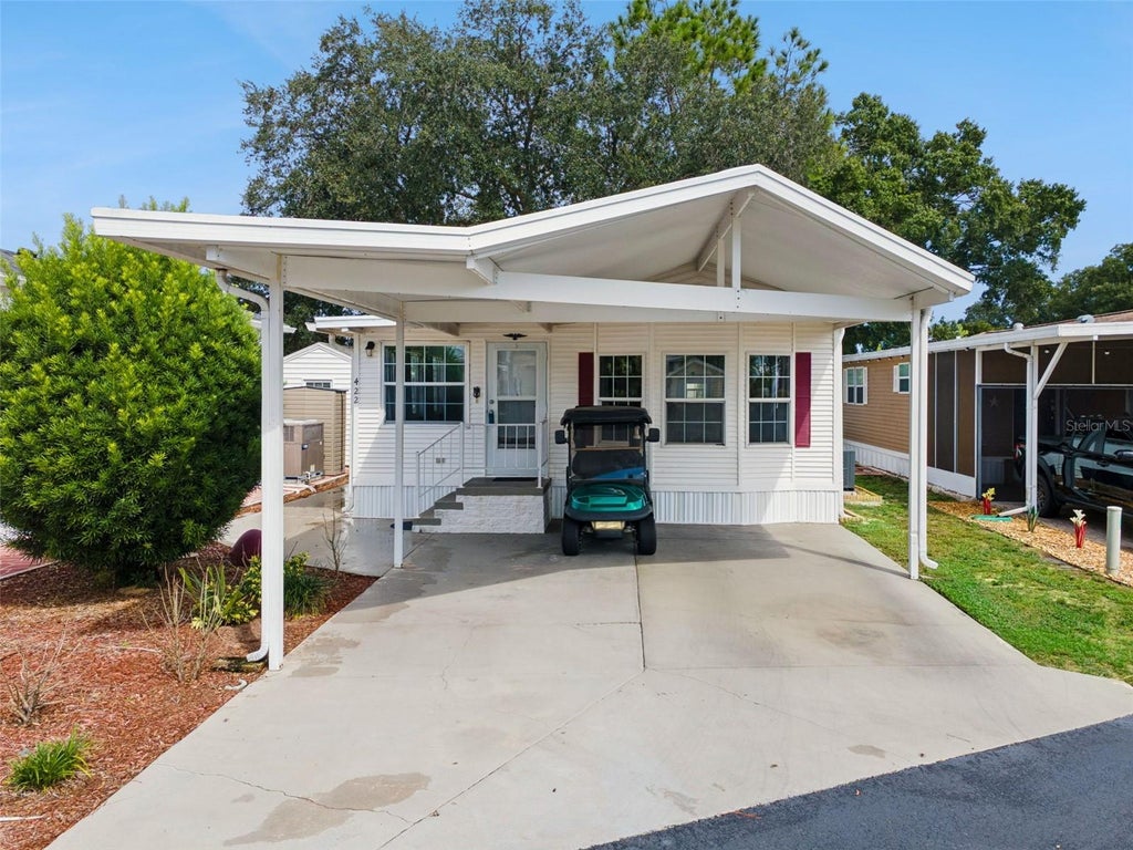 Photo of 422 Gary Player Drive, Davenport, FL 33837 (MLS # S5157812)