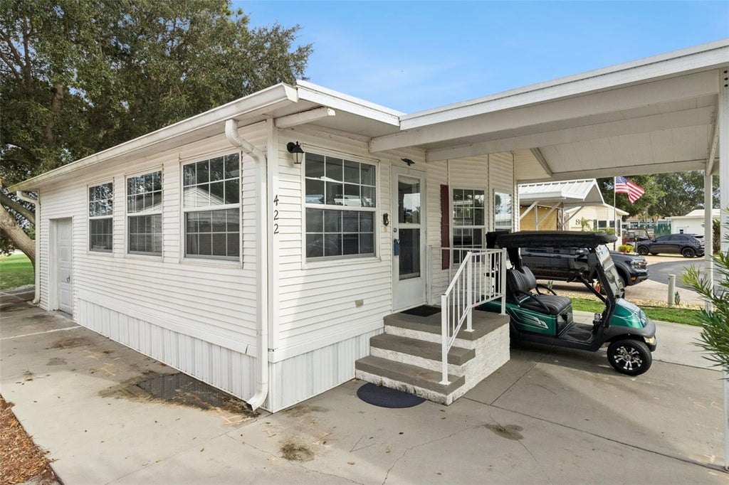 Photo of 422 Gary Player Drive, Davenport, FL 33837 (MLS # S5157812)
