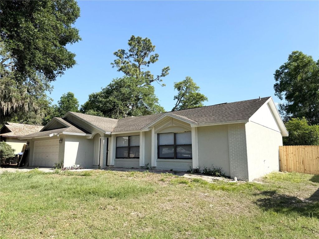 Photo of 3402 Bretwood Drive, Orlando, FL 32808 (MLS # O6400015)
