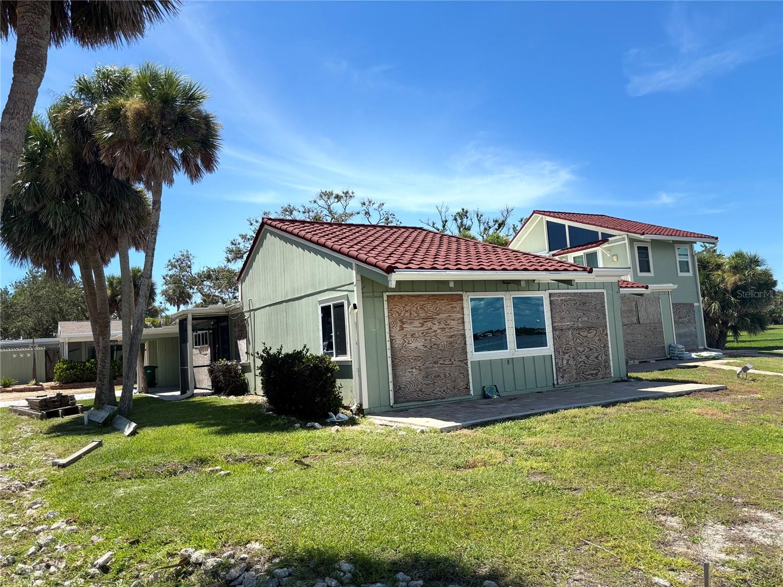 MILLION-DOLLAR VIEW – STEPS FROM THE BEACH!
Discover your own slice of paradise with this 2-bedroom, 2-bath villa in the sought-after Admiralty Villas community on Manasota Key! This charming free-standing bungalow offers an open floor plan with unobstructed views of the Bay—a rare find at this price.
While the property sustained significant damage from Hurricanes Milton and Helene, it’s now a prime opportunity to create your dream coastal retreat. Customize every detail to match your style and lifestyle needs.
Enjoy covered attached parking that keeps your vehicle protected and close at hand. After a day on the beach, refresh in the outdoor shower with both hot and cold water.
Admiralty Villas is a unique gulf-to-bay community nestled among swaying palms and majestic oaks, offering amenities such as a heated pool, clubhouse, and 12 boat slips (available on a first-come, first-served basis).
Located just minutes from Englewood’s beaches, restaurants, shopping, and historic downtown, this villa offers the best of coastal living at an unmatched value.
Opportunities like this don’t come along often—call today to schedule your private viewing!