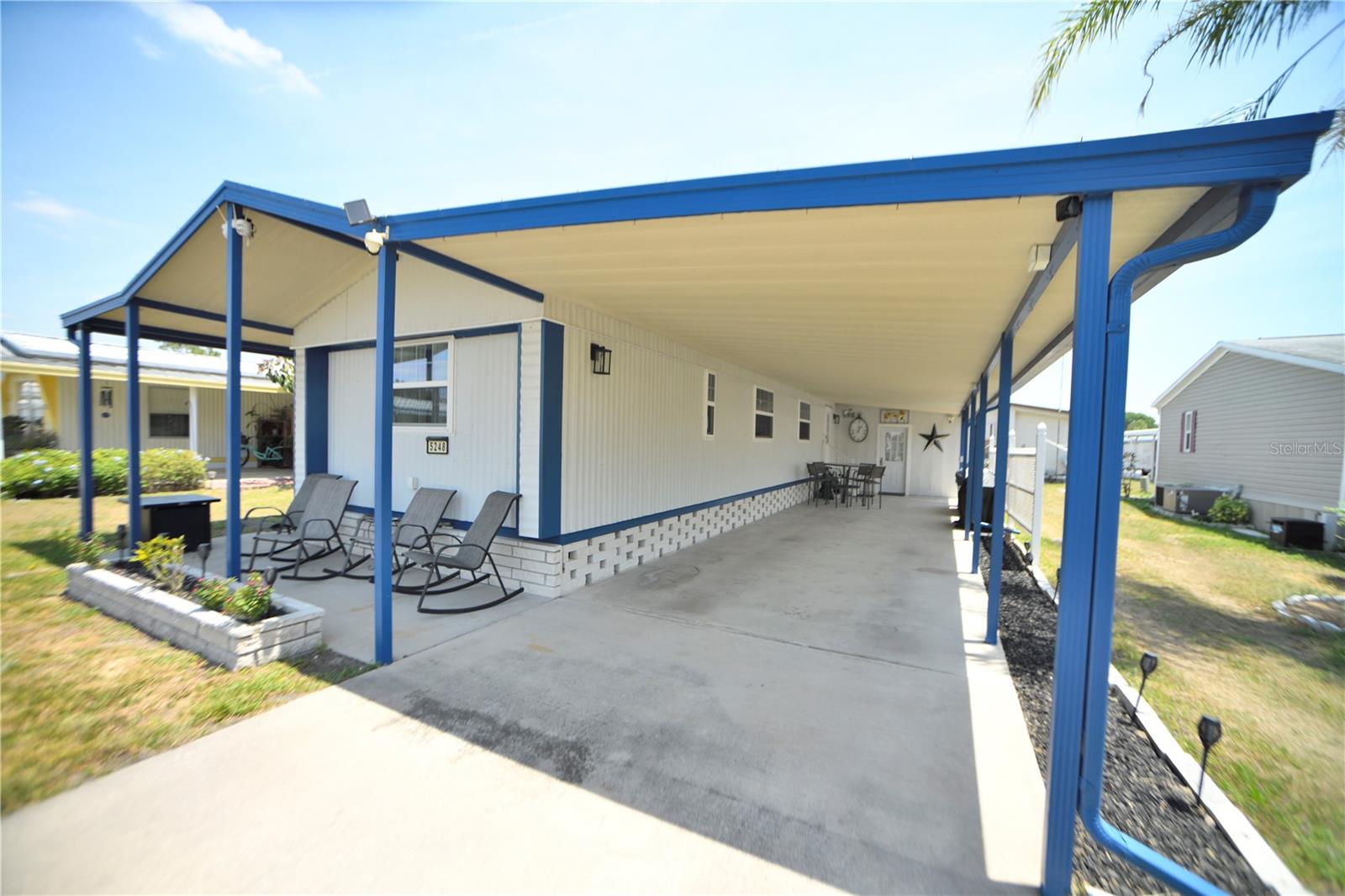 Looking for Florida retreat or a full time home ?? Now is the time to come down to sunny Florida and Oaks Royal I&II active 55+ community where you OWN the land with a low annual HOA fee of $440. This beautifully updated, FULLY furnished 2BR/2BA home can be yours. The updated kitchen offers updated fixtures, sink and newer SS appliances. The open floor plan between kitchen and living room allows for ease of visiting with friends and family. The Florida room which is accessed through French doors has insulated ceiling and walls, thermal windows, laminate floors and with the addition of a mini-split unit makes this a wonderful 4 seasons room and a really nice entertaining space. The home offers a split bedroom plan. The master has carpet, ceiling fan and ensuite bathroom with step-in shower. Bedroom two, at the opposite end of the home has laminate floor, ceiling fan and built-in closet and shelving. The nicely updated second bathroom is located next to this room and has granite-topped vanity, tub/shower combo and updated, high commode. The laundry/storage/golf cart attached shed is located at the front of the double carport and has washer/dryer storage space and a roll up door for your golf cart. In addition to the updates listed above the AC is 5yrs old. Hot water tank was replaced two years ago and has new thermal pane windows all around. Please see attached addendum of all furnishings included with the sale price. Schedule your appointment today and don't let this one get away!
