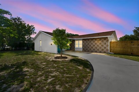 Photo of 9015 Forest Oaks Boulevard, Spring Hill, FL 34606 (MLS # TB8506126)