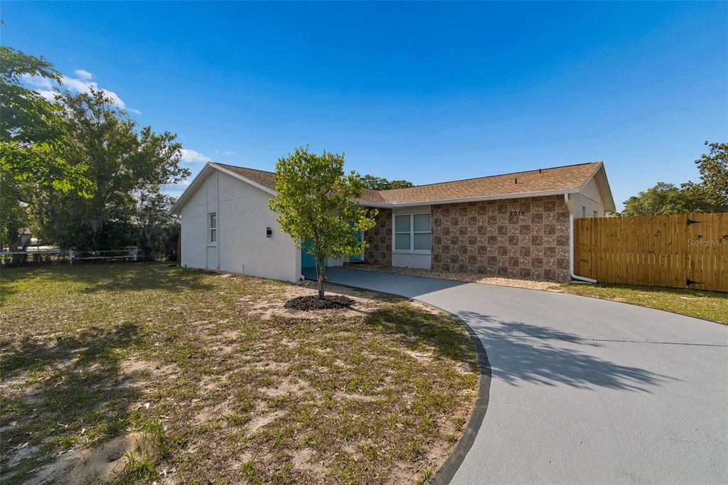 Photo of 9015 Forest Oaks Boulevard, Spring Hill, FL 34606 (MLS # TB8506126)