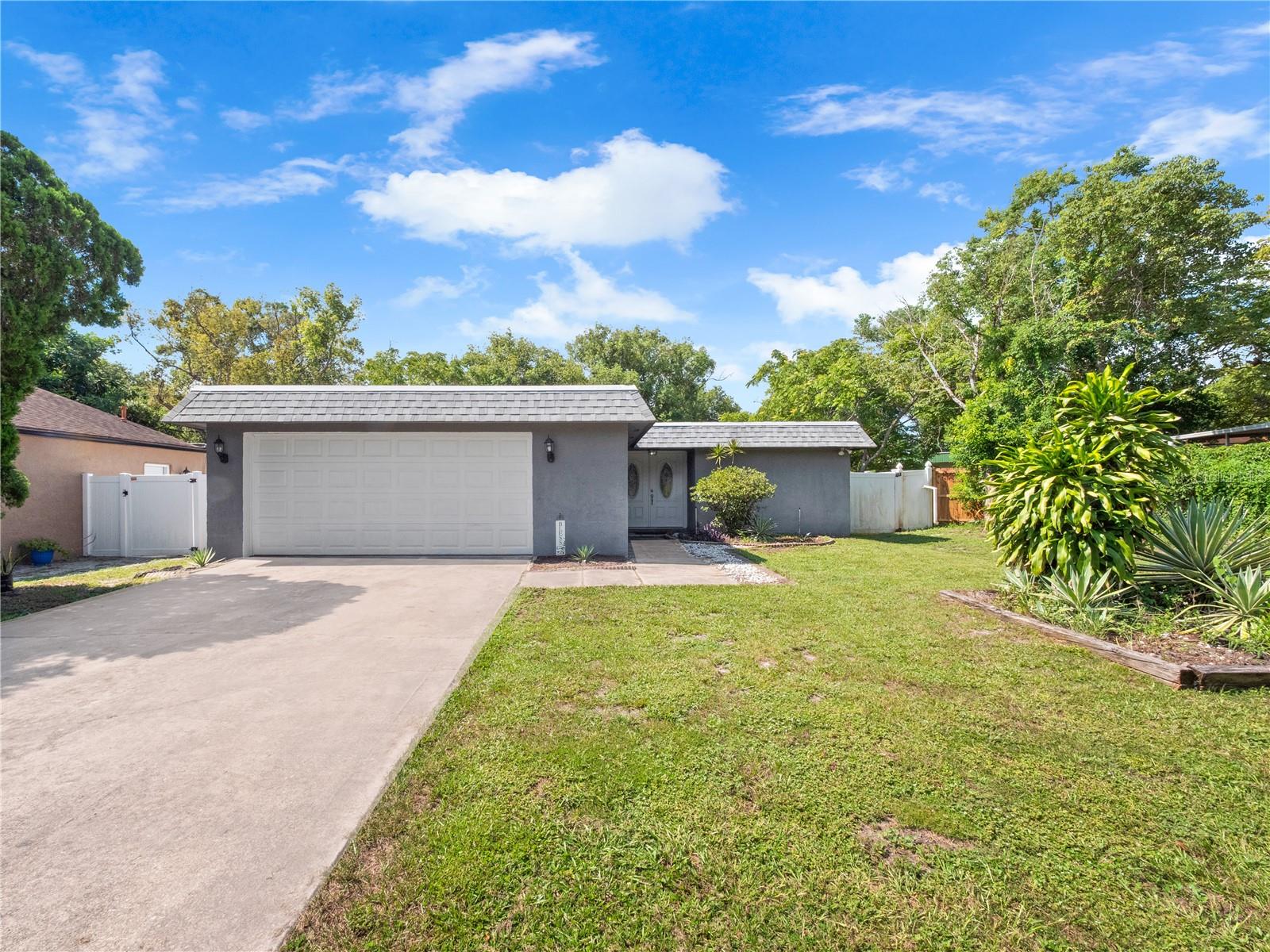Welcome to 207 Bitterwood St – A Pool Home Gem in the Heart of Winter Springs! Tucked into a quiet, established neighborhood with NO HOA, this move-in-ready 3-bedroom, 2-bath home sits on a generous 9,104 sq ft lot and offers the perfect blend of space, comfort, and convenience. Step inside to find an open, flexible floor plan with neutral tile flooring throughout, spacious living and dining areas, and a well-equipped kitchen featuring wood cabinetry, mosaic tile backsplash, and stainless steel appliances with gas range. Multiple sliding doors create seamless indoor-outdoor flow and flood the home with natural light. The split-bedroom layout includes a large primary suite with walk-in closet, step-free tiled shower with grab bars, and direct access to the screened lanai, perfect for morning coffee or evening relaxation. Outside, you'll love the oversized fenced yard, sparkling in-ground pool, and not one but TWO enclosed Florida rooms. This is ideal for a home gym, game room, or all-season entertaining. Double gate access on both sides makes room for recreational vehicles, boats, or trailers. Additional features include no carpet with tile throughout for easy maintenance, updated lighting and ceiling fans, fully fenced yard with mature trees and landscaping, two spacious bonus rooms under roof and a 2-car garage with extended driveway. The home is in a prime location close to SR 434, 17-92, Publix, Home Depot, Casselberry Wheel Park, zoned for top-rated Seminole County schools with easy access to Orlando, Lake Mary, and Oviedo. With solid bones, a versatile layout, and unbeatable outdoor potential, this home offers the opportunity to live your Florida dream or make a smart investment in one of Central Florida’s most desirable areas. Don't wait! Schedule your showing today, because this Winter Springs pool home won’t last long!