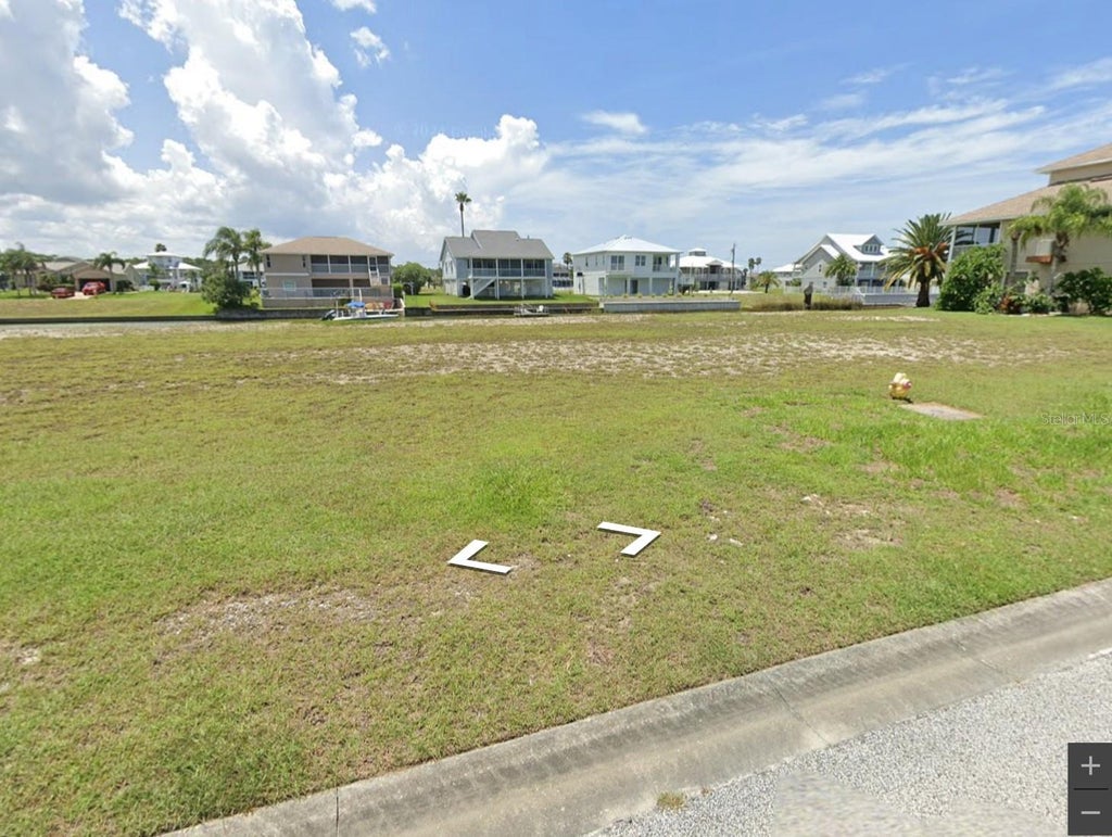 Photo of 3472 Cobia Drive, Hernando Beach, FL 34607 (MLS # O6443562)