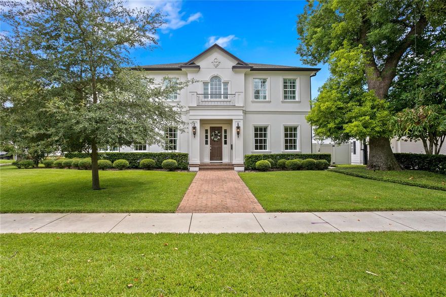 Nestled on one of Golfview's most charming brick-lined streets with trees canopied above, this exquisite custom home embodies the timeless elegance and superior craftsmanship that Bayfair is known for.  Offering 5 bedrooms, 6 bathrooms, plus an office/playroom & expansive loft/bonus room, this home features 5494 sf of pure luxury.  The oversized corner lot provides a spacious front yard and a convenient side entry to the 3-car garage.  The home's interior is a showcase of refined details, including soaring ceilings, wide plank wood floors, expansive windows that flood the space with natural light, Control4 automation, and whole-house audio & security systems. The natural gas, whole-home generator system also provides continuous peace of mind. Designed with entertainment in mind, the formal dining room is perfect for elegant dinner parties, complemented by a butler's pantry with a tall wine fridge, dry bar, and a massive walk-in pantry with custom built-ins.  The kitchen is a chef's dream, equipped with Thermador appliances, including a double convection oven, 6-burner gas cooktop, microwave drawer, side-by-side refrigerator and freezer, farmhouse sink, and two dishwashers.  Solid wood cabinets, marble countertops, and a large island with seating for seven make this kitchen the heart of the home, ideal for both cooking and gathering.  The kitchen seamlessly flows into a spacious living room, adorned with a coffered ceiling and flat stone gas fireplace.  French doors lead to a covered patio, where you can enjoy outdoor living at its finest.  The patio offers space for both dining and relaxation around the custom fire pit. The heated saltwater pool & spa provide a tranquil oasis, while the screen enclosure and turf backyard offer low-maintenance green space.  The outdoor kitchen, complete with a sink, Green Egg cooker, grill, and TV, is perfect for socializing and watching the big game.  There is also convenient access to the downstairs bathroom directly from the patio.  Head up to the cozy bonus loft area above the garage, where wood beams and a brick accent wall create a cozy and private retreat.  Downstairs, the home also includes a separate office or flex room, as well as a private guest suite, complete with its own en suite bathroom.  Upstairs, the elegant primary suite features his and hers custom closets and a luxurious en suite bath with an expansive walk-in shower, multiple shower heads, a soaking tub, dual vanities, and a separate water closet.  Three additional bedroom suites, each with their own en suite bathroom, and a large laundry room with built-in storage complete the upper level.  Every detail of this home has been thoughtfully designed to provide maximum elegance and comfort.  Schedule your showing today!