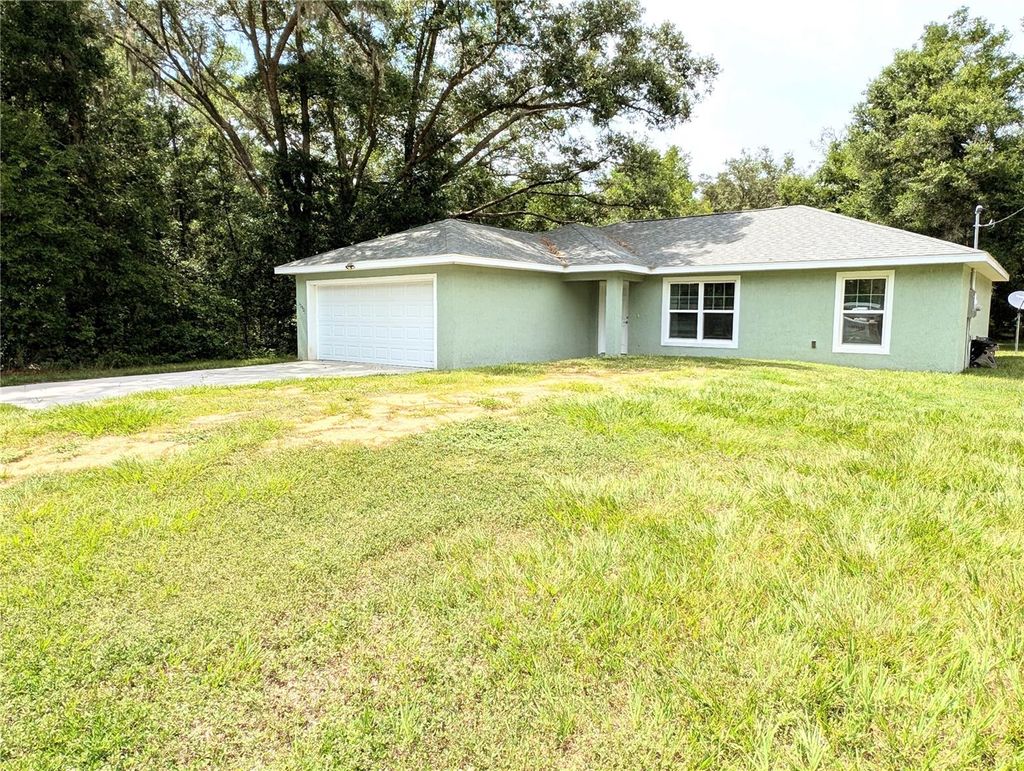 Photo of 13921 SW 108th Lane, Dunnellon, FL 34432 (MLS # OM703110)