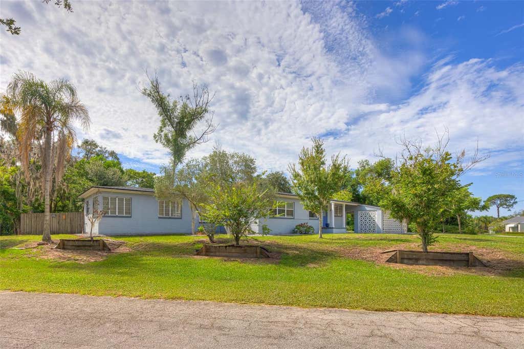 Photo of 45 S University Circle, Deland, FL 32724 (MLS # V4950883)