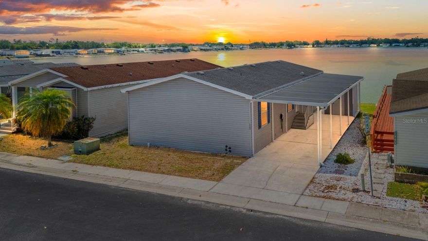 Welcome to this beautifully updated waterfront home located in the highly sought-after gated community of Lake Fantasia, in the heart of Riverview. This immaculate 2007 manufactured home offers 2 bedrooms, 2 bathrooms, and 1,220 heated square feet with 1,938 gross square feet of thoughtfully improved living space, all perfectly positioned on a large lake with peaceful water views.

From the moment you arrive, you will appreciate the charming curb appeal with freshly painted shutters and siding, vinyl exterior, covered carport, electric vehicle charger, and separate locked storage area complete with shelving. Inside, this home has been meticulously cleaned, updated, and professionally staged, offering buyers a true move-in ready experience. The interior has been freshly painted throughout in modern Agreeable Gray tones and features brand-new blinds, updated lighting fixtures, new smoke detectors, and a bright welcoming atmosphere.

The spacious kitchen has been beautifully refreshed with brand-new stainless steel appliances including a refrigerator, range, microwave, and dishwasher, while the washer and dryer are also included for added convenience. The primary suite offers dual closets and an upgraded en-suite bathroom featuring elegant gray tile, a beautiful vanity, and a stunning walk-in shower. The secondary bathroom has also been tastefully updated and includes a tub/shower combination with modern finishes.

One of the most exceptional features of this home is the serene screened-in back porch, which has been freshly stained and re-screened, creating the perfect place to enjoy your morning coffee while overlooking the tranquil lake, feeding the fish, and watching the birds. Residents can enjoy non-motorized lake activities such as kayaking, paddleboarding, and canoeing, making this property a rare waterfront gem.


With a low HOA of just $149 per month, residents enjoy access to community amenities including a gated entrance, speed bumps for added safety, a community pool, community center, and golf cart-friendly streets. Centrally located near shopping, dining, entertainment, and major interstates, this property offers convenience, lifestyle, and incredible value.

Previously reduced in price before renovations were completed, this home is now being offered at $209,900 with extensive upgrades already completed, allowing buyers to benefit from the seller’s investment while securing an exceptional waterfront property at an outstanding value. This beautifully maintained home truly offers affordable Florida living at its finest. Schedule your private showing today before this incredible opportunity is gone.