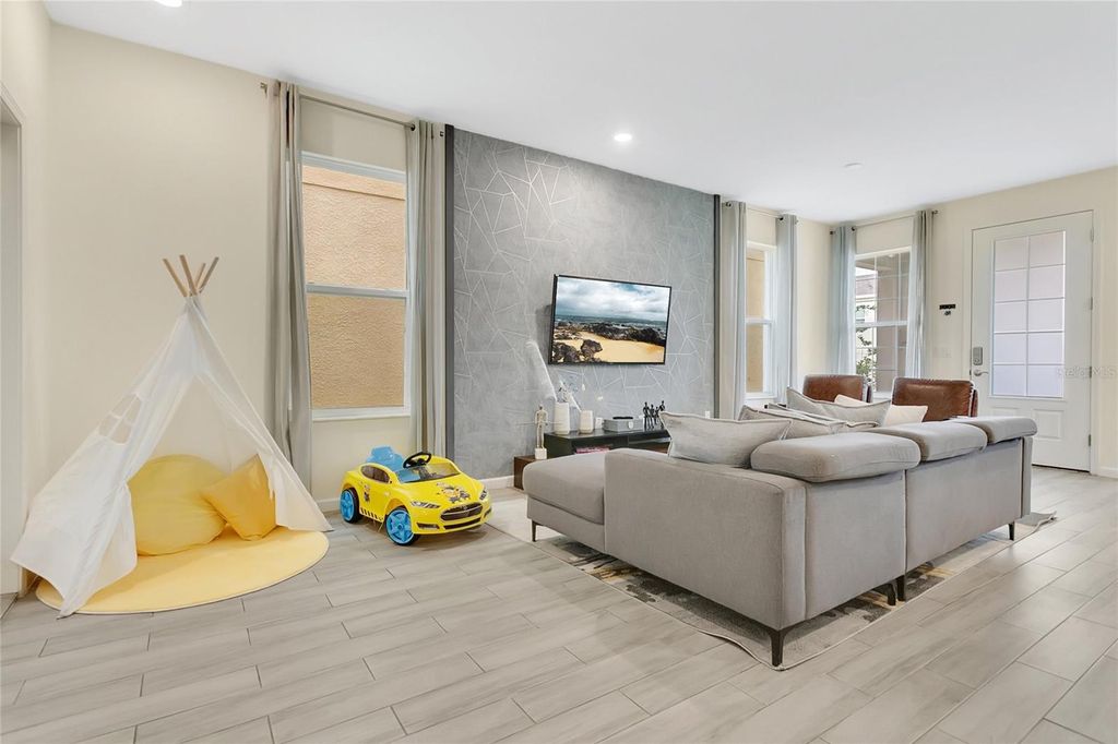 Photo of 262 Bella Prestwick Boulevard, Davenport, FL 33837 (MLS # O6400042)