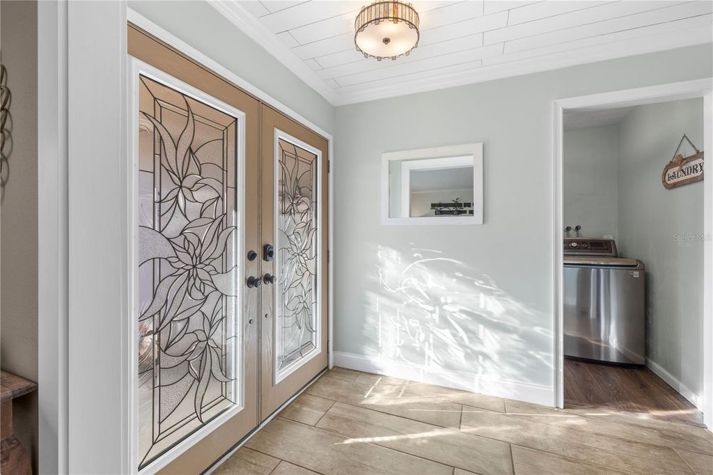 Photo of 2843 Oak Tree Lane, Palm Harbor, FL 34684 (MLS # V4947063)