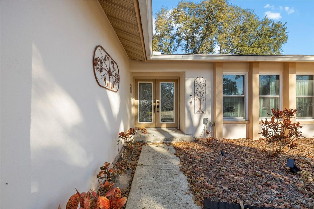 Photo of 2843 Oak Tree Lane, Palm Harbor, FL 34684 (MLS # V4947063)