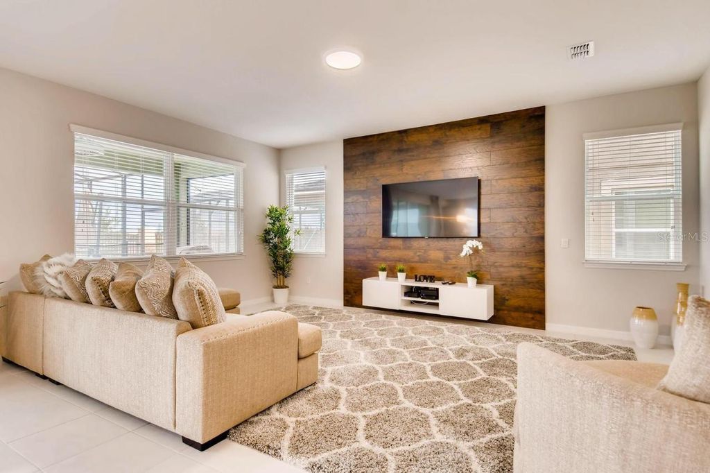 Photo of 9035 Sunshine Ridge Loop, Kissimmee, FL 34747 (MLS # O6362805)