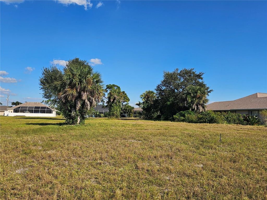 Photo of 184 Rotonda Boulevard N, Rotonda West, FL 33947 (MLS # TB8428142)