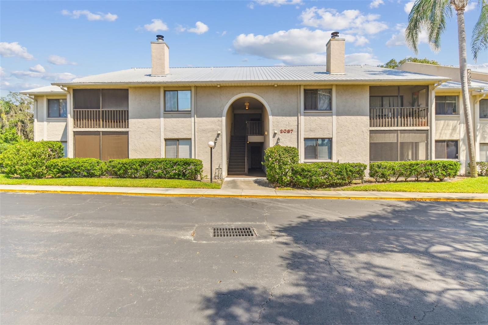 Welcome to your Dunedin oasis! Step into this fully renovated 2-bed, 2-bath condo—a turnkey gem, furnished and ready for your Florida lifestyle. The airy living area with vaulted ceilings welcomes you. Luxurious vinyl plank flooring adds allure throughout. A smart split floor plan places the guest suite on the left, with an updated guest bathroom. Ahead, find the primary suite with a walk-in closet and modern en-suite. The kitchen flows seamlessly into the living area, boasting sleek, functional, soft-close cabinets. This condo offers more: a wood-burning fireplace, indoor laundry, offered FULLY FURNISHED, and nearby storage. Hunters Glen is pet-friendly, low HOA, and offers a heated pool. Centrally located in Dunedin, explore all this charming area offers. Don't miss this meticulously remodeled condo—your new haven awaits! It won't last long!
