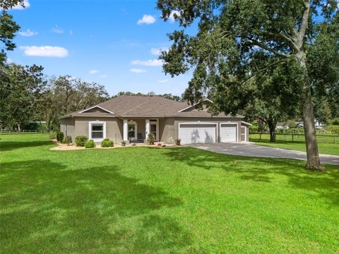 Photo of 95 Rabbit Hollow, Brooksville, FL 34604 (MLS # W7889150)