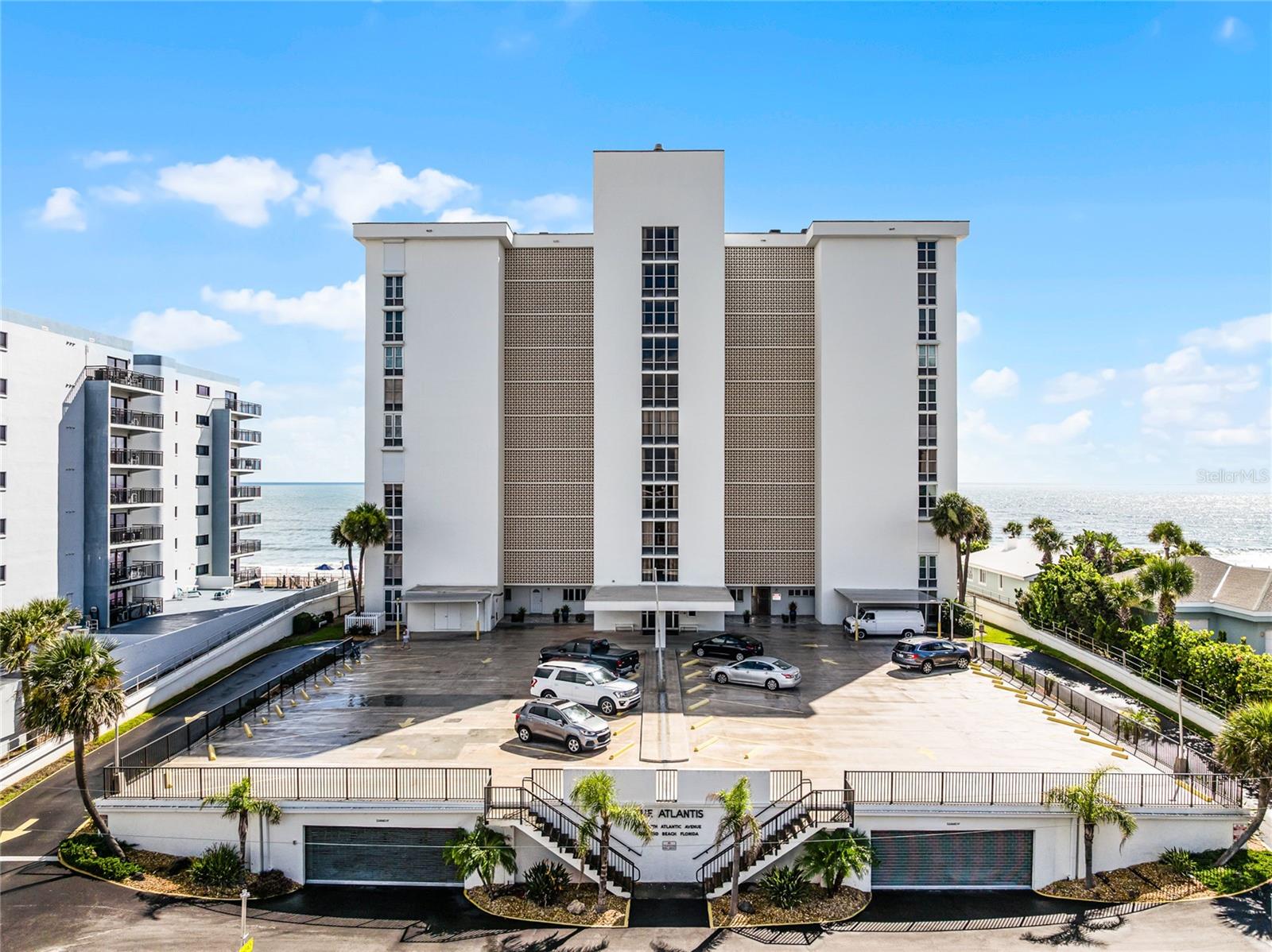 Enjoy beachfront living in this 2-bed, 2-bath condo at The Atlantis! This 3rd-floor unit offers ocean views from your private balcony and has been updated with luxury vinyl flooring. Hurricane shutters provide peace of mind, and the open living/dining layout makes the space feel bright and inviting. The community features a heated oceanfront pool, private beach access, clubhouse, and secured entry. Conveniently located near shops, restaurants, and parks. Can be rented with a 4-month minimum—perfect for a full-time residence, winter retreat, or seasonal rental.