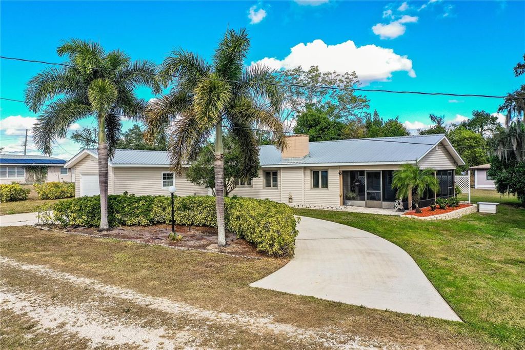 Photo of 1305 Arbuckle Creek Road, Sebring, FL 33870 (MLS # L4958459)