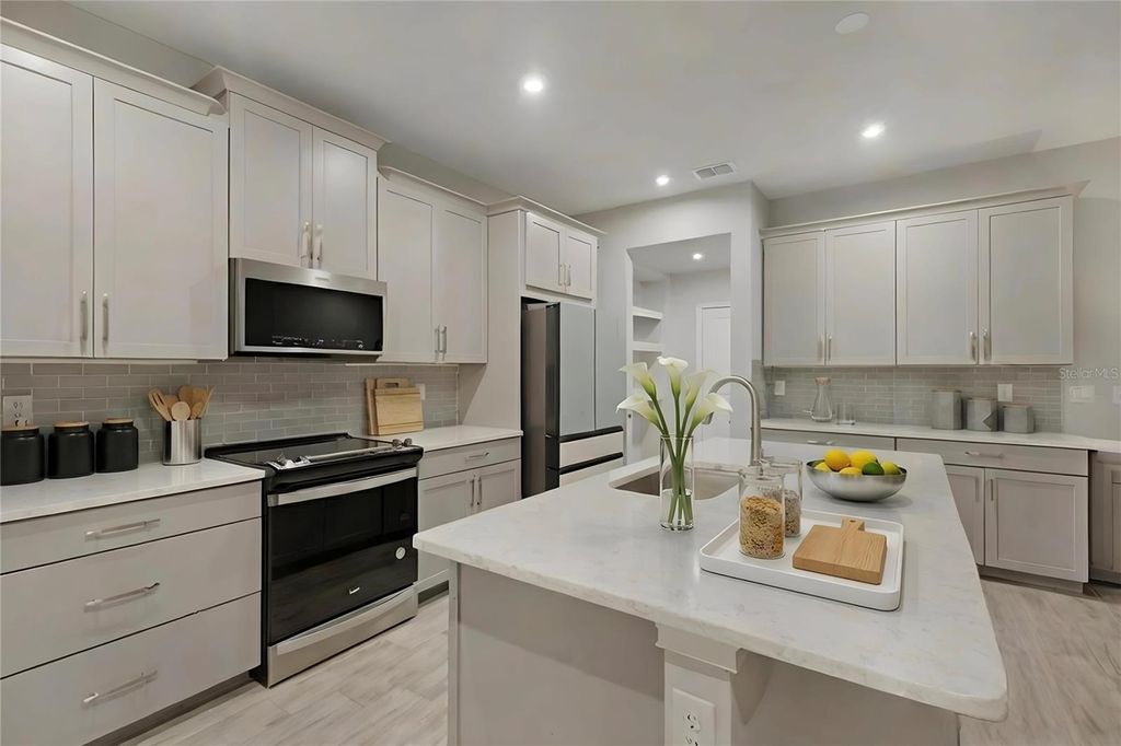 Photo of 19431 Monarch Wind Way, Lutz, FL 33558 (MLS # TB8460810)