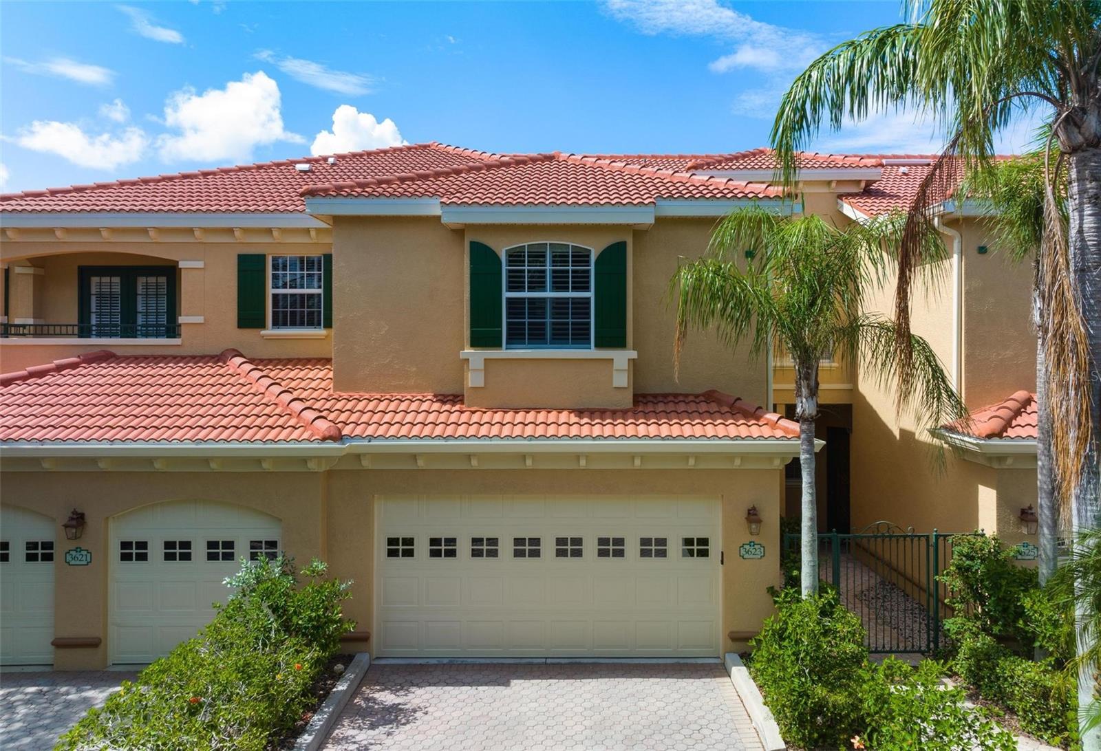 Schedule a private live tour today! This home will not disappoint. Palmer Square West is an upscale intimate community located within Palmer Ranch. This sought after 3-bedroom townhome with elevator and 2-car garage is in immaculate condition having been lovingly maintained by the current owner. This home has a new cement tiled roof completely paid for in January 2023. The exterior of the property and interior of the lanai have been recently freshly painted. The home is situated in the quiet back part of the complex which has a dead end so little traffic. The first floor has a beautiful kitchen complete with granite counters and a new disposal in 2021 and a new refrigerator in 2022. A cozy breakfast nook is here for that morning coffee. Entertain family and friends in the warmth of the living and formal dining rooms which overlook lush landscapes and a pond with a fountain. A half bath is here along with access to the garage and elevator to second floor. Retreat to the master suite, a sanctuary of relaxation with an en-suite bathroom featuring dual vanities, a soaking tub and walk-in shower. The guest bathroom has been tastefully updated and can also become an en-suite with access to the adjoining bedroom. The 3 bedrooms are thoughtfully designed and offer plenty of space for family, guests or a home office with larger than average closets in each. Slide open the glass doors to the outside oasis, where a screened lanai awaits. Relax and enjoy the lush landscaping and water view which creates a private and serene atmosphere, making this the perfect spot to unwind. Nestled in the heart of Sarasota this residence offers an exceptional opportunity to experience the very best of Florida living with access to Sarasota's renowned amenities. World class beaches such as Siesta Key beach is just a short drive; the YMCA for fitness and tennis; Potter Park and Prestancia Golf and Country Club next door welcomes neighbors to join and take advantage of the golfing facilities. In addition, the Legacy Trail for cycling and walking is close, shopping, dining, theatres and so much more. This home is more than a home, it is a lifestyle statement.