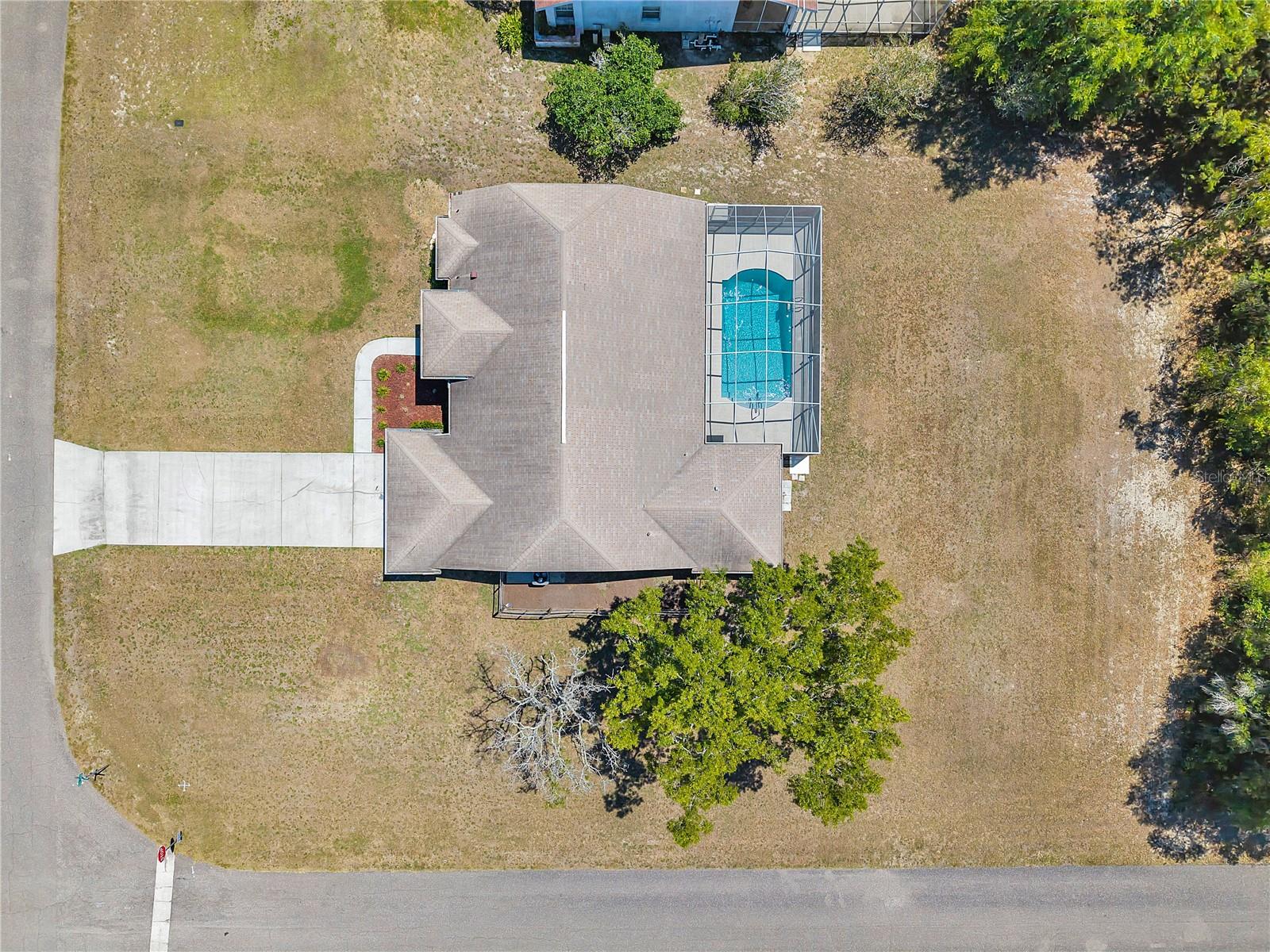 Location, convenience and a beautiful layout plan, this elevated Florida lifestyle home can be yours today. This AFFORDABLE, charming pool home is located in the highly sought-after community of Amber Woods in Spring Hill Florida, with NO HOA fees, NO CDD Fee and NO FLOOD Hazard Insurance needs!!! This beautiful and rare gem home comes with an OVERSIZED CORNER LOT SPACE, HIGH CEILING that offers a generous 1,989 sqft living space that features a spacious 3-BED, 2-BATH, a Private POOL, an OVERSIZED 2 car garage.
The MOVE-IN READY home was recently upgraded with NEW HVAC 2025, NEW WATER HEATER 2025, SALT WATER POOL with a new Pump. Step inside to discover a bright, open layout design that flows seamlessly from the living room, dining room and kitchen areas. The Master bedroom has a modern design which boasts a serene retreat with its own en-suite bathroom, providing a private oasis for relaxation with a SPACIOUS WALKING-CLOSET. The two additional bedrooms are generously sized, offering versatility for guest rooms, home offices, or playrooms. THE LAUNDRY room has brand new cabinets and the washer and dryer remain with the home. The kitchen is a chef's dream with modern appliances, closet pantry, counter bar, PLENTY OF 42” CABINETS with easy to clean countertops and space for preparing meals, ideal for family gatherings! A seamless OPEN-CONCEPT floor comes with multiple windows that allows NATURAL LIGHT to flood the space, creating a warm and inviting atmosphere that also lets you enjoy nature from within the comfort of your home while having breakfast, lunch, dinner or simply a nice cup of coffee.
The large screened in lanai offers hours of enjoyment and the half-acre oversize corner lot provides plenty of space for outdoor activities and gardening. Whether you're hosting BBQs, lounging by the pool, or enjoying quiet evenings under the stars, this backyard is your personal haven. This home os conveniently located in proximity to shopping, dining, and entertainment. This property allows for freedom to enjoy the neighborhood with no homeowners association rules. Don't miss the opportunity to make this stunning and affordable home yours!! Schedule a showing today!!!