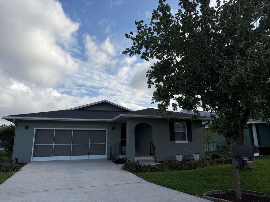 Beautifully maintained and move-in ready 2BR/2BA home in desirable SE Winter Haven, located in Lake Dexter Moorings with low HOA and access to a community pool, private boat ramp, and dock on Lake Dexter. Major updates include a brand new roof installed February 2026 and fresh exterior paint, showcasing true pride of ownership.

This well-cared-for home features a split bedroom plan with the primary suite in the rear and guest bedroom in the front. Spacious living/dining room combo flows into a bright kitchen with breakfast nook and ceiling fan. New laminate flooring throughout (tile in entry). Enjoy the large Florida room with sliding door access—perfect for entertaining.

The primary suite offers a walk-in closet and en suite bath with a walk-in shower, and skylight. Guest bath is also updated with a skylight. Additional highlights include a fenced backyard, custom tile patio, and a 2-car garage with washer/dryer hookups, utility sink, and screened sliding door. A truly well-maintained home you don’t want to miss!