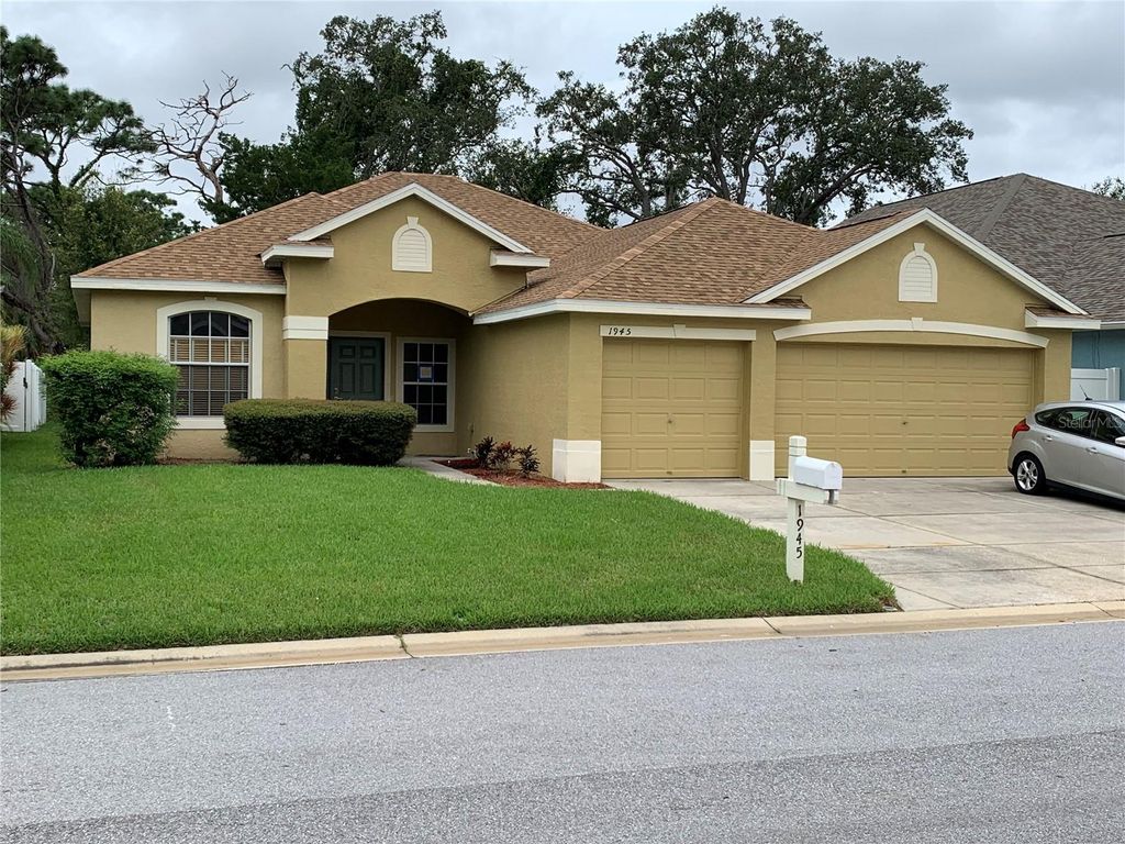 Photo of 1945 Blue River Road, Holiday, FL 34691 (MLS # TB8443203)