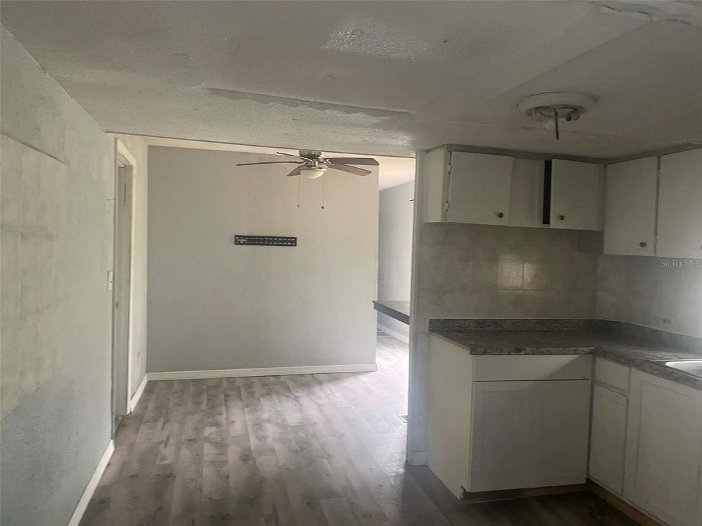 Photo of 8716 N Tangerine Place, Tampa, FL 33617 (MLS # TB8499926)