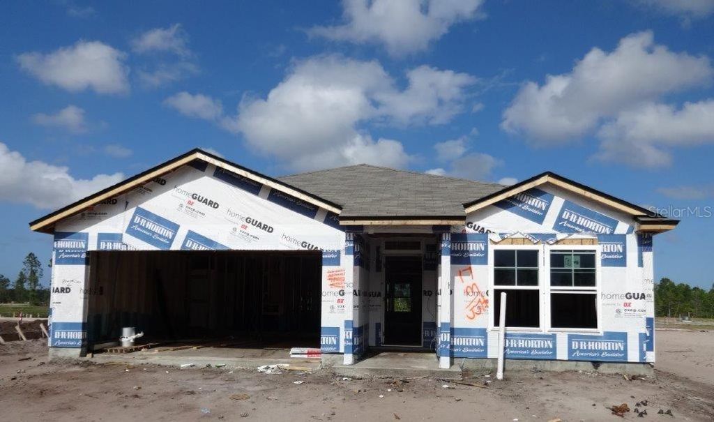 Photo of 20 SUMMERWOOD ROAD S, PALM COAST, FL 32137 (MLS # FC290285)