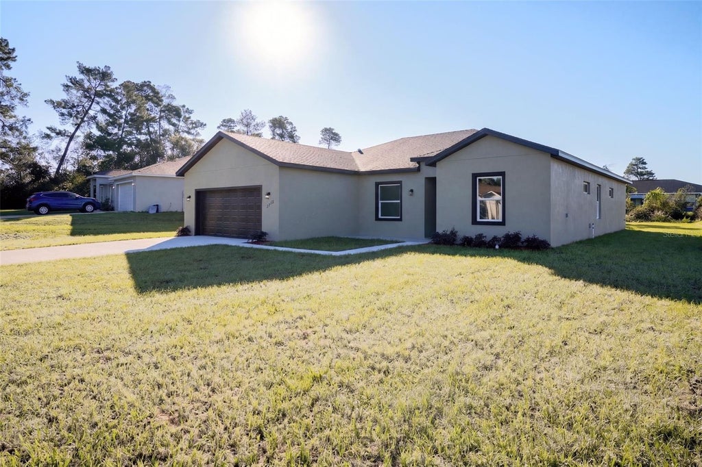 Photo of 2570 SW 156th Lane Road, Ocala, FL 34473 (MLS # O6452456)
