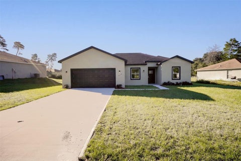 Photo of 2570 SW 156th Lane Road, Ocala, FL 34473 (MLS # O6452456)