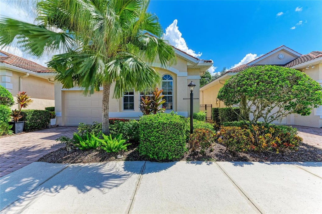 Photo of 7751 33rd Street E, Sarasota, FL 34243 (MLS # A4705220)