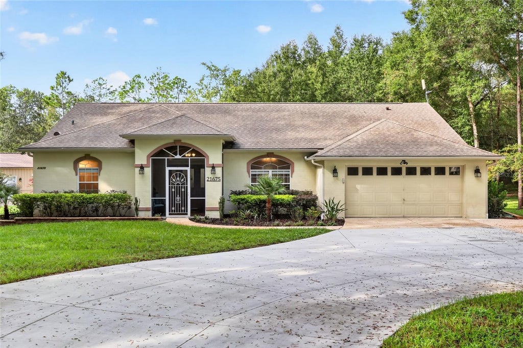Photo of 21675 SW 84th Loop, Dunnellon, FL 34431 (MLS # OM731918)