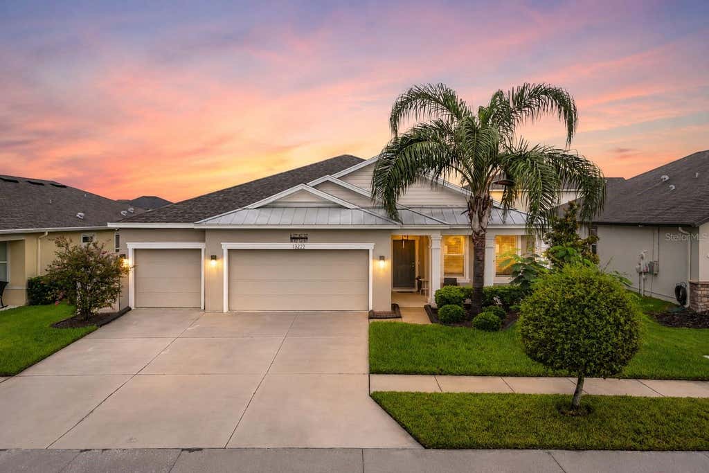 Photo of 13222 Moss Grass Way, Riverview, FL 33579 (MLS # O6429933)