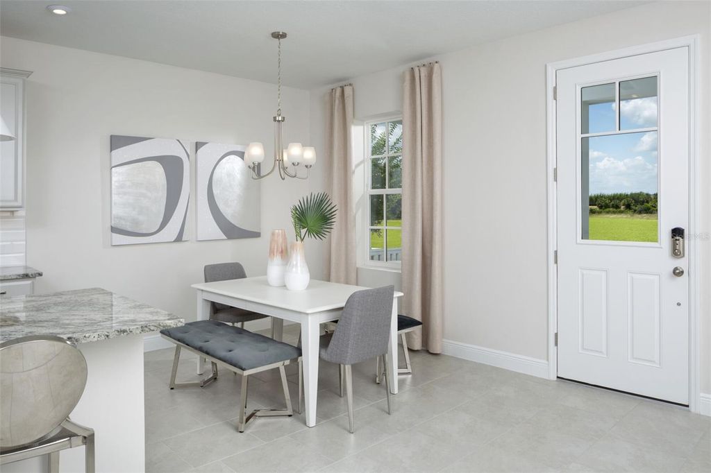 Photo of 1895 Seawall Way, Celebration, FL 34747 (MLS # O6349360)