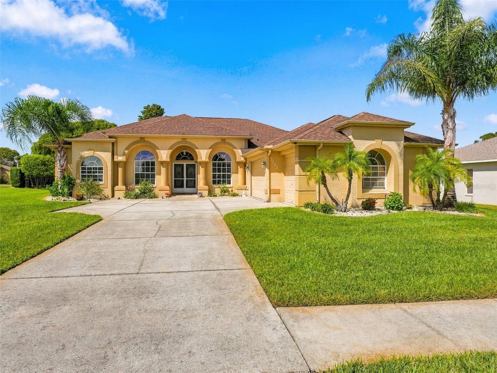 Photo of 3542 Conifer Loop, Spring Hill, FL 34609 (MLS # TB8553931)