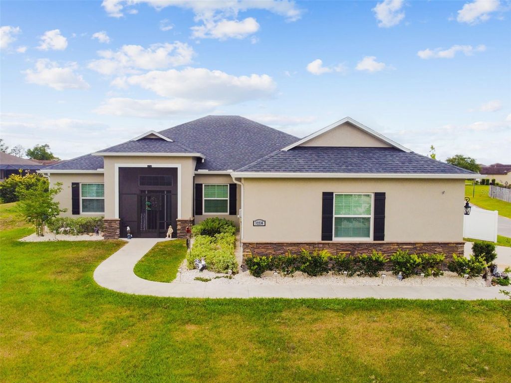 Photo of 5840 Bent Grass Drive, Valrico, FL 33596 (MLS # J986090)