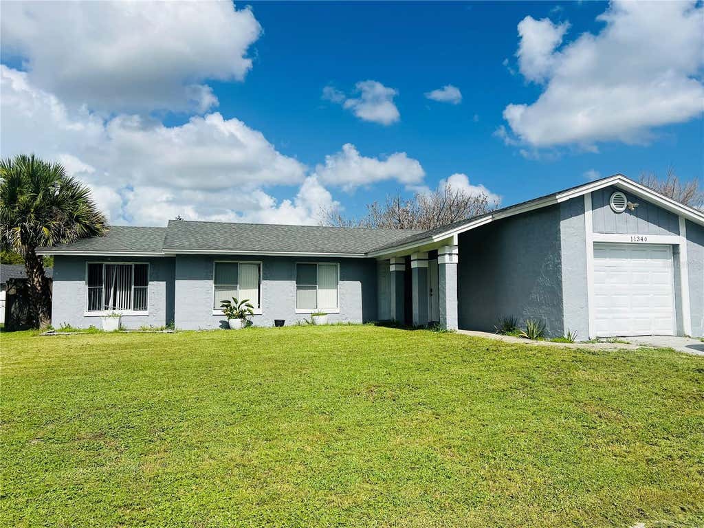 Photo of 11340 Cardiff Drive, Orlando, FL 32837 (MLS # O6426306)