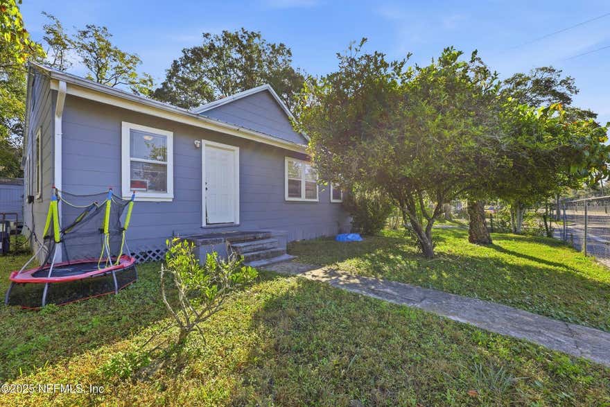Welcome to this well-maintained 3-bedroom, 2-bath home featuring an updated kitchen, modern laminate flooring, and thoughtful accessibility upgrades. A ramp leads to the back door for easy entry, and the home includes a fully accessible bathroom designed for added comfort and convenience. The property also offers a large storage shed and a fully fenced (chain-link) yard with gated driveway parking. Whether you're seeking a primary residence or an investment opportunity, this home provides excellent value and functionality. Home is ready for move in! Seller is open to open to seller financing/sub to financing offers!
